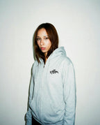 Sudadera tag con cremallera