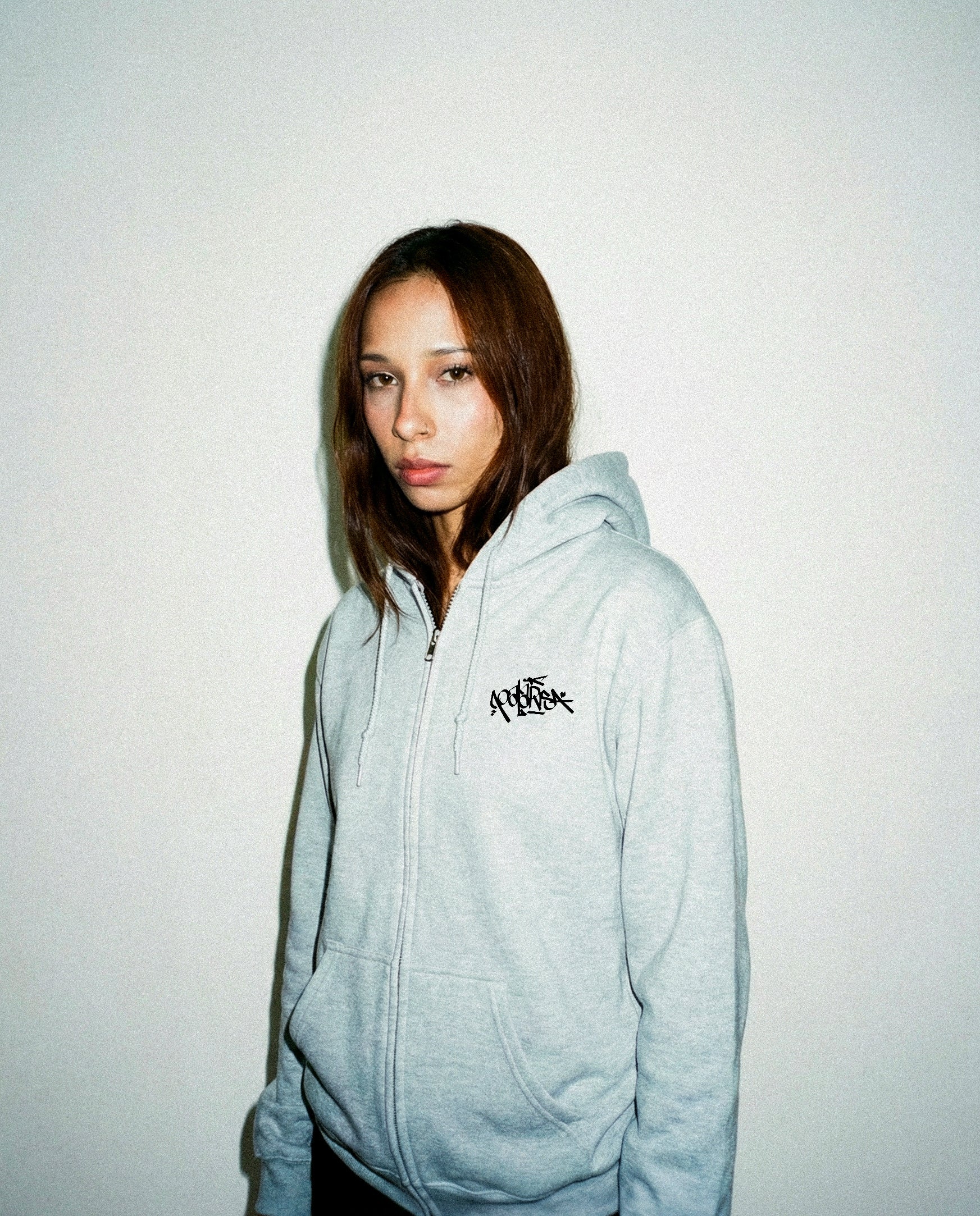Sudadera tag con cremallera